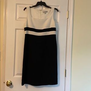 Classic black and white sleeveless sheath dress.